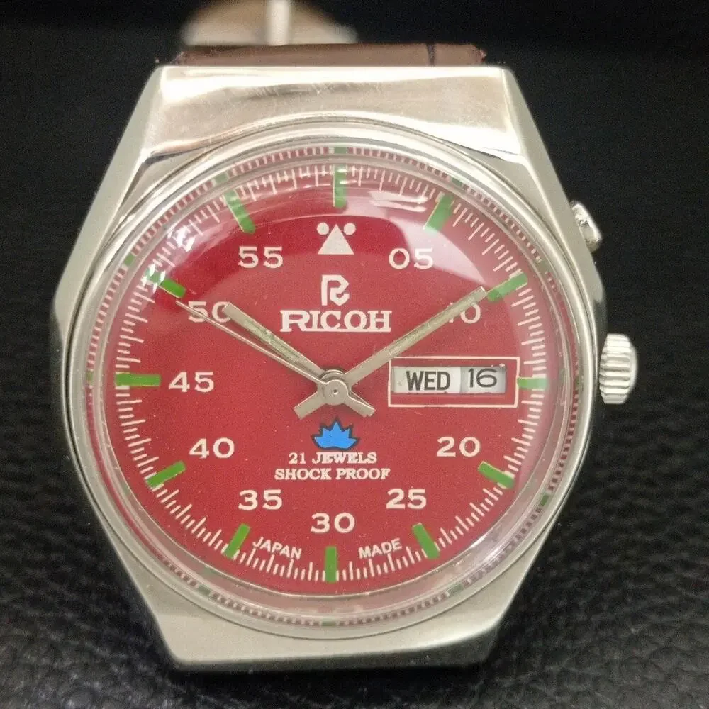 Vintage 1971 Ricoh Automatic Mens Silver Watch W/daydate & Red accents